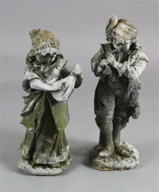 A pair of lead garden statues, H.1ft 10.5in.
